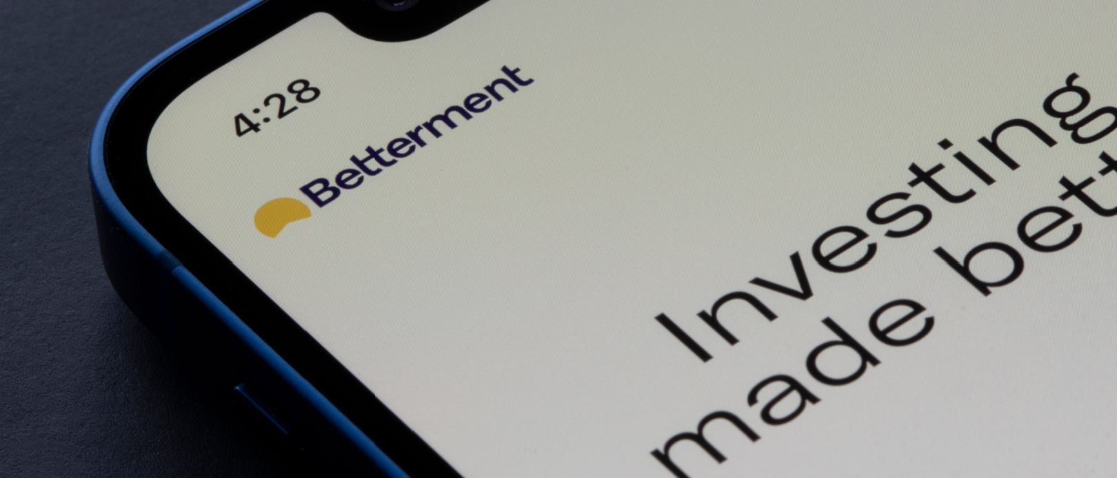 Closeup of Betterment logo seen on its app login page on an iPhone. Betterment is a financial advisory company providing robo-advising and cash management