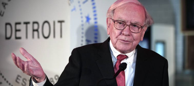 Warren Buffett, chairman and CEO of Berkshire Hathaway, speaks during a press conference at Ford Field in Detroit, Nov. 26, 2013.